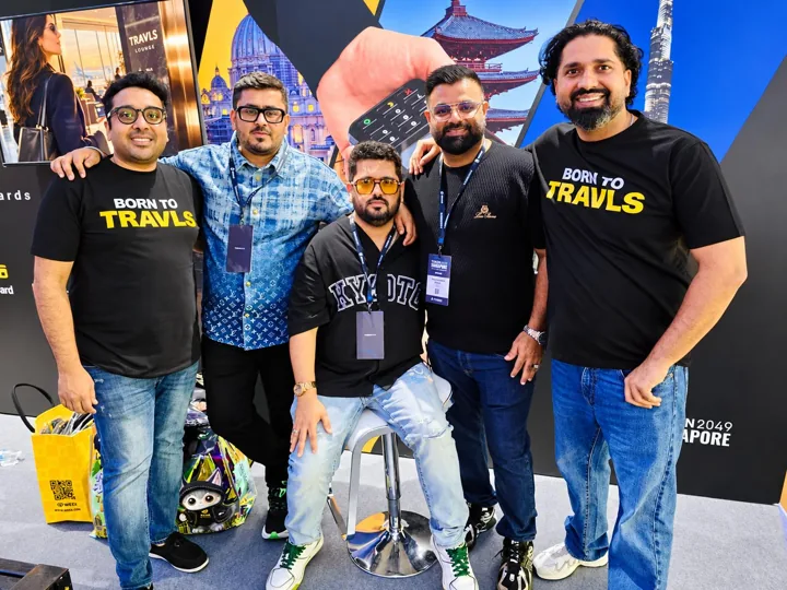 Travls team and guests together at the TOKEN2049 Singapore booth